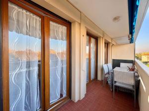 Appartement T2 avec balcon, résidence arborée, parking