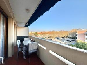 Appartement T2 avec balcon, résidence arborée, parking