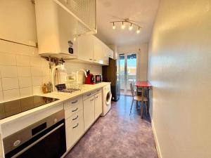 Appartement T2 avec balcon, résidence arborée, parking
