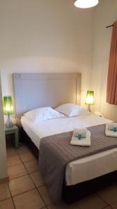 Appart'hotels UZES APPART HOTEL Residence Le Mas des Oliviers : photos des chambres