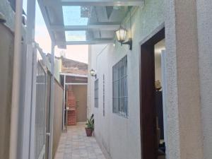 Apartamento na praia 2 qt com quintal e churrasqueira