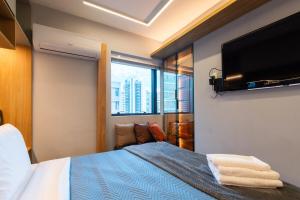 Style flat perto Av Paulista - Wifi - Garagem - 4 pessoas - Ar cond
