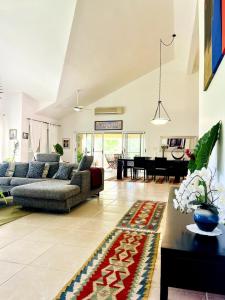 Elegant Golf Retreat with Jacuzzi Terrace - 3BR Apartment in Guavaberry Golf and Country Club - Gated Resort