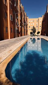 Premium 3BR Apartment Pool Parking Comfort