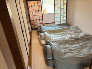 Guesthouse NanairoDougoなないろゲストハウス