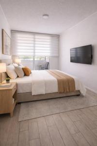 Moderno departamento 2D ,con estacionamiento, excelente ubicación, a una cuadra de el metro