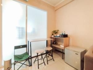 Contemporary Style 1BR Apartment at Gateway Pasteur By Travelio