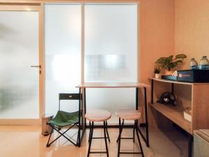 Contemporary Style 1BR Apartment at Gateway Pasteur By Travelio
