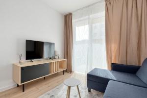 Przytulny Apartament w Dobrej Lokalizacji z Ogródkiem i Parkingiem by Noclegi Renters