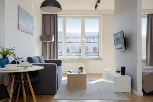 Wola Pet-friendly Apartments with AC Sławińska by Noclegi Renters