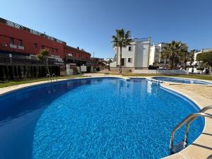 Costa Blanca Beach Apartment with Sunny Balcony & Pool