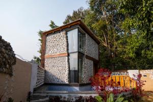 Hobbit House Jim corbett whispering roots