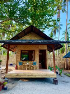 Native Nipa Huts by Sirem Beach Resort