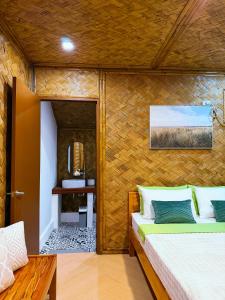 Native Nipa Huts by Sirem Beach Resort