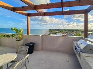 PB311 Studio beira-mar em Tamandaré com Rooftop e vista By Oasis Ferias