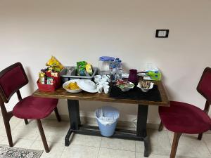 Enjoy a distinctive stay next to the Museum of Civilization Our luxury apartment in Fustat City combines comfort and culture in a wonderful location near the Fustat Hills and Gardens in Central Cairo