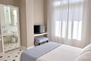 Calamari Homes - Centenario 304 - Walled City