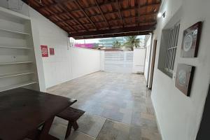 Casa 150m da Praia das Toninhas C Churrasqueira