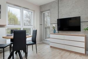 Modern Apartment with Parking and Balcony by Noclegi Renters