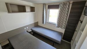 MH T14 entre pins et océan 2 chambres et 2 salles de bain dans camping 4 étoiles