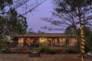 SaffronStays Terra Soul - 3BR eco-luxury pet-friendly pool villa with gazebos, bar & fish pond near Imagica & Pali Temple