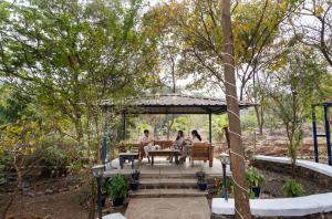 SaffronStays Terra Soul - 3BR eco-luxury pet-friendly pool villa with gazebos, bar & fish pond near Imagica & Pali Temple