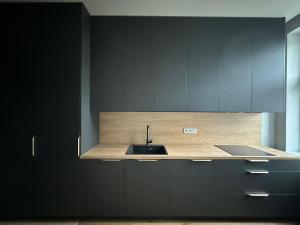 Comfort in Muted Tones - Vivien Apartments Character & Atmosphere