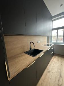 Comfort in Muted Tones - Vivien Apartments Character & Atmosphere