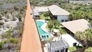 Carandaí a poucos passos do mar