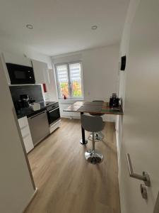 Ferienwohnung Ruhepunkt Dessau - zentral nahe Bauhaus und Meisterhäusern - mit gratis WLAN und Parken sowie Komplettküche
