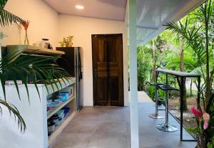 Jungle apartment with bathtub and outdoor shower