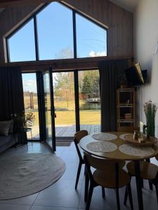 Trzy Stodoły - Kraina Łąk domki całoroczne na Roztoczu