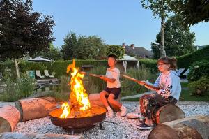 Garden Paradise Bled Apartments - garden, pond and castle view