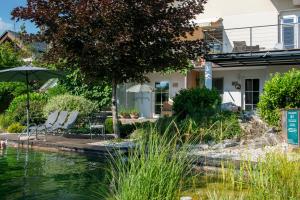 Garden Paradise Bled Apartments - garden, pond and castle view