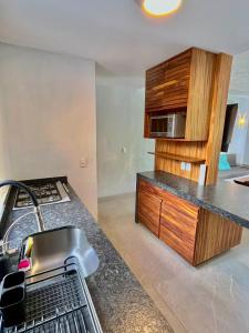 Where Vallarta Breathes, Lush Garden Condo steps to the beach