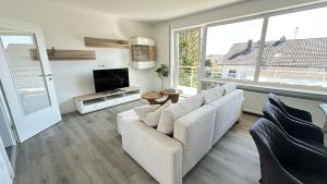 10 min von Legoland entfernter Familienhaus, Sonnige Familienfreundliche, große 100m2, 3 Zimmerwohnung, Whirlpool im Garten, NETFLIX, WLAN, fürs erste Frühstück gefüllter Kühlschrank, wunderschöner Balkon, privater Parkplatz