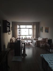 Quarto no apartamento do anfitrião na Praia do Canto