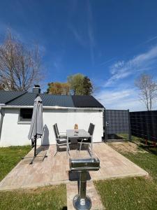 Tiny House mit Garten und Sauna