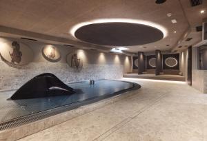 Aparthotel Familiaris - Family Apartments - Pools & Spa in Dolomites