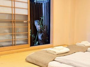 难波4分钟车站旁 机场直达 通天阁 心斋桥 梅田 Usj 全新日式 2卧室1厨1卫1浴 最大5人