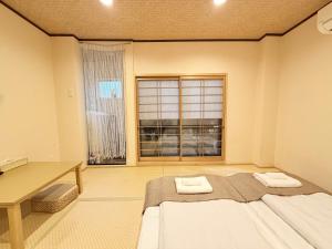 Next to Namba Station 4 minutes Direct airport access Tsutenkaku Shinsaibashi Umeda USJnew Japanese-style 2 bedrooms1 kitchen1 toilet1 bathroom Sleeps 5