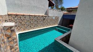Casa com picina e área gourmet