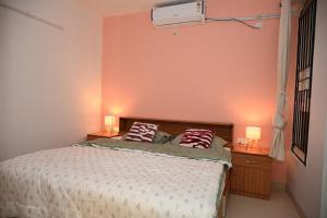 Ivory Serene By LuxeHomes Luxury 1BHK AC Near Airport Balcony Parking