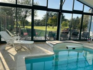Appartement premium dans propriété avec parc et piscine chauffée privée