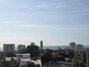 Apto familiar con piscina cerca a la playa