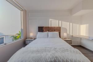 Modern two-bedroom apt with park views San Isidro