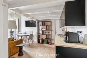 Pied a terre elegant en plein centre de Paris