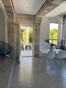 Delightful villa with steps down to secluded beach