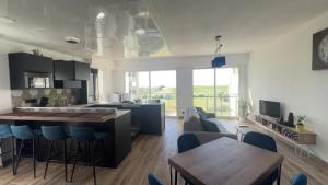 Appartement face golf et océan