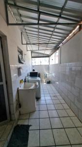 Apartamento tranquilo e perto da praia com self check-in